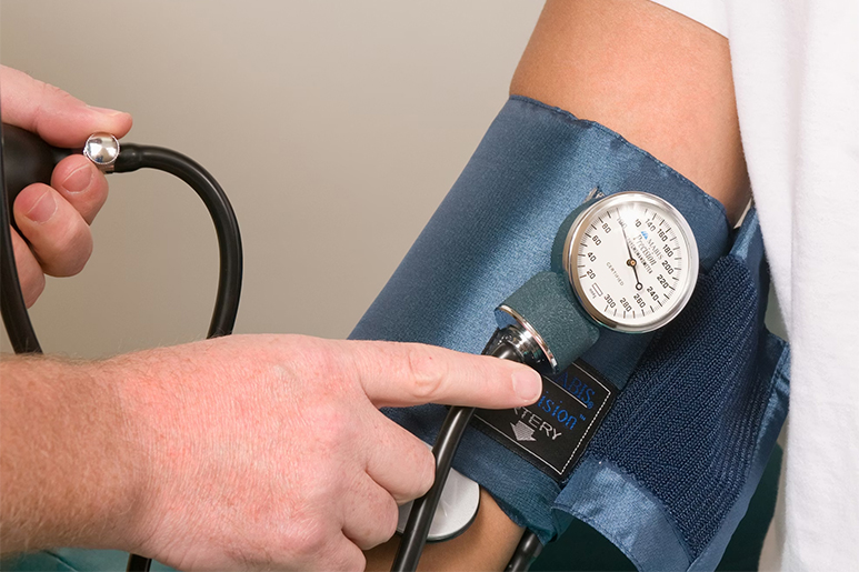 A healthcare professional who takes a patient's blood pressure