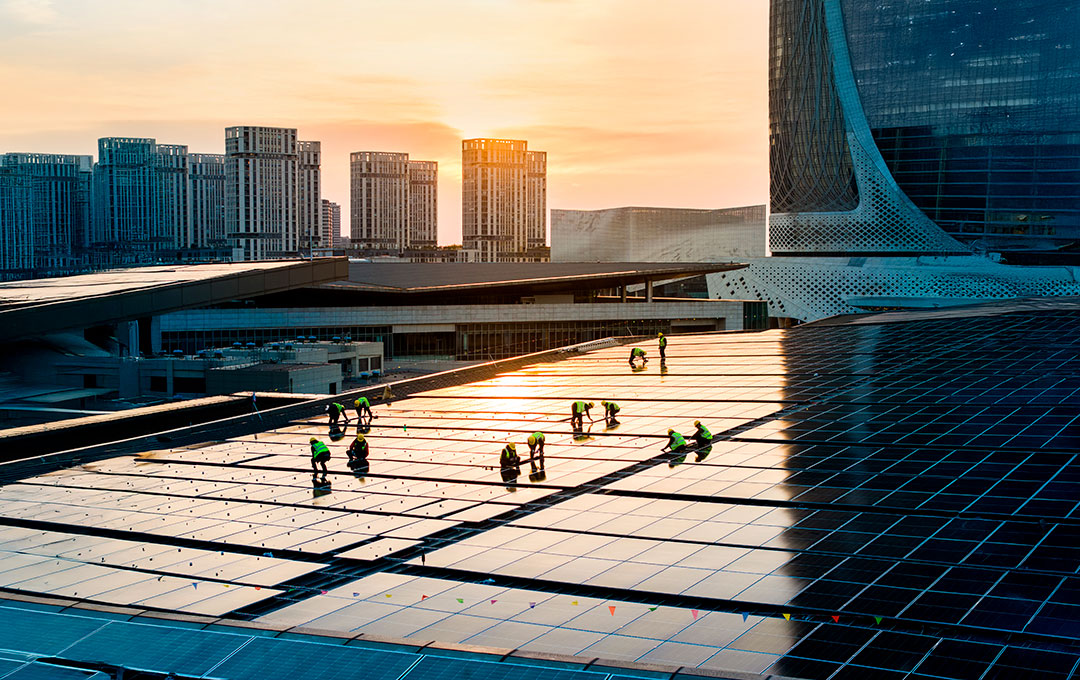 People working on solar panels