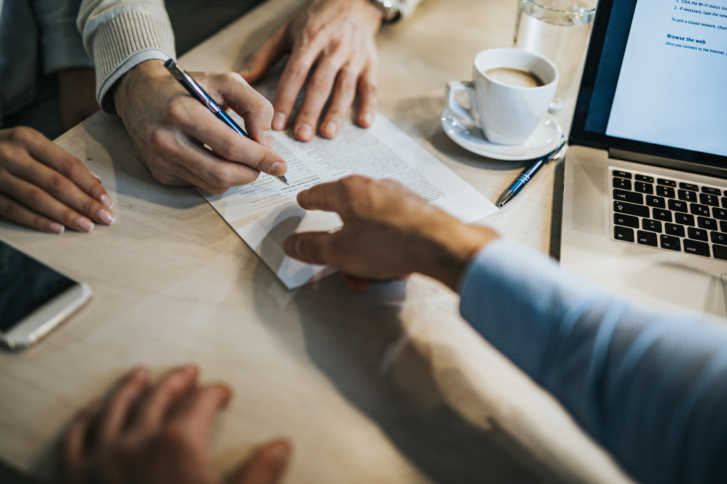 An advisor helping his clients choose between an RRSP and a TFSA. 