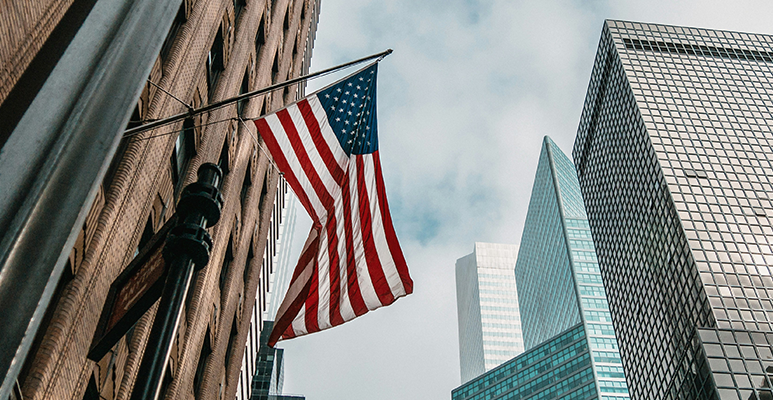 American flag in city